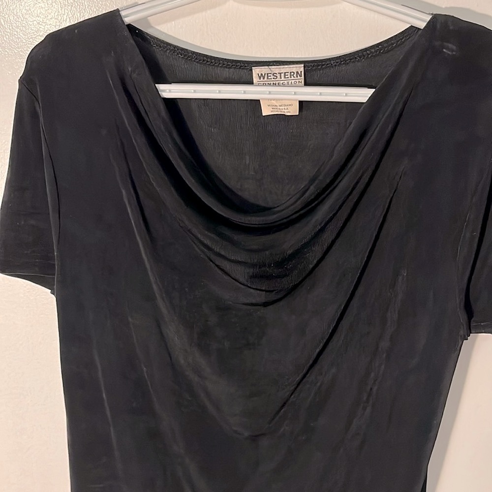 Beautiful draping black sexy top. Soft and comfortable. Size M